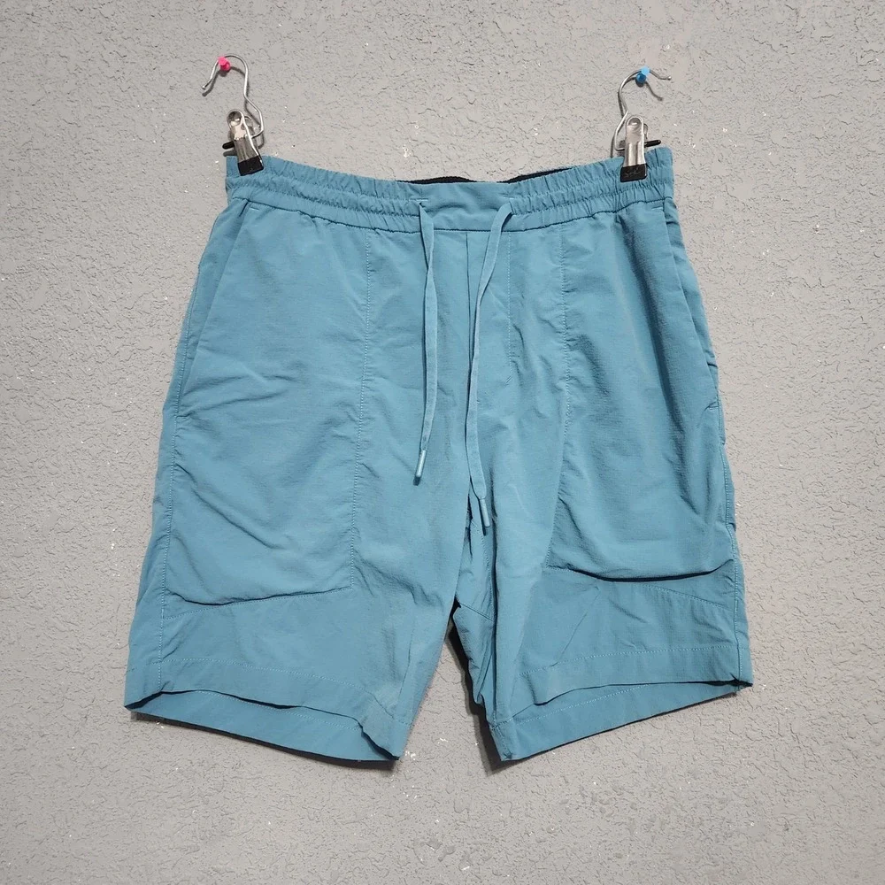 Lululemon BOWLINE Shorts 5" Men's Medium Teal Lightweight Stretch Athleisure - Picture 1 of 7